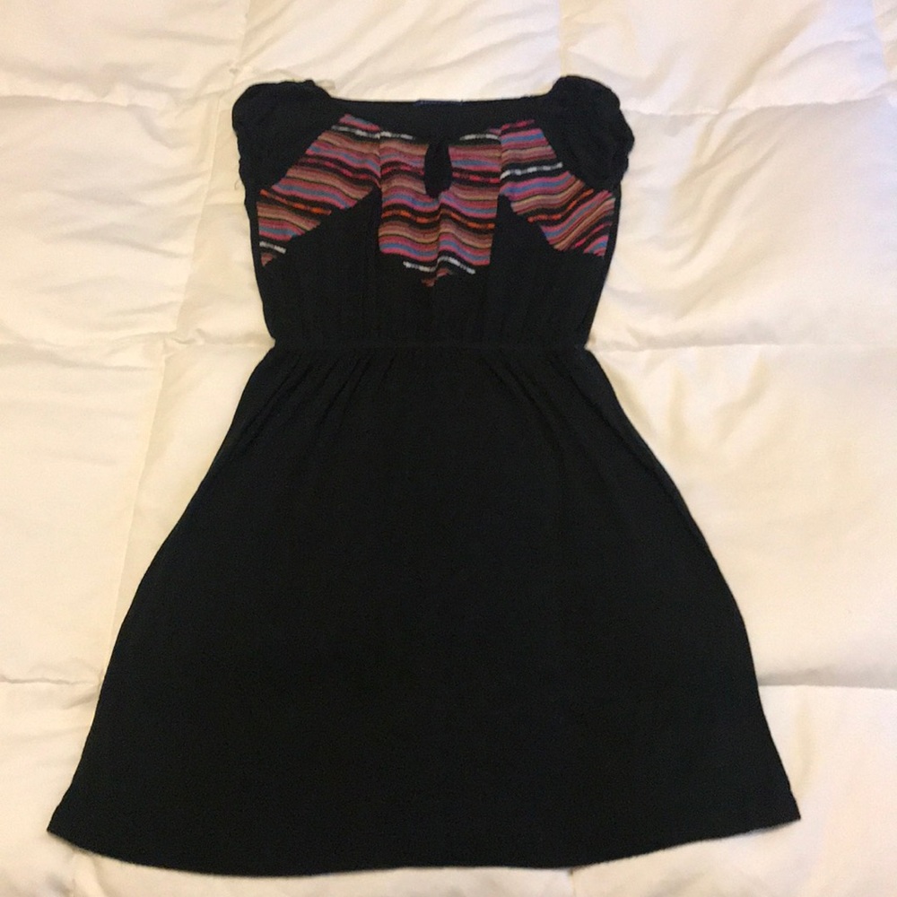 Cap sleeve dress with bodice detail.